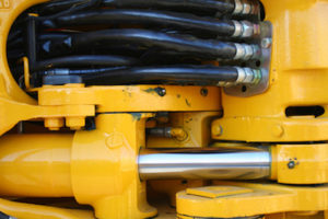 Hydraulic elements of the heavy building bulldozer of yellow color horizontally, (look similar images in my portfolio)